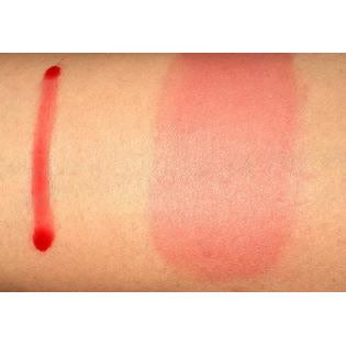 Swatch of red lipstick on skin with a pink blush swatch next to it.