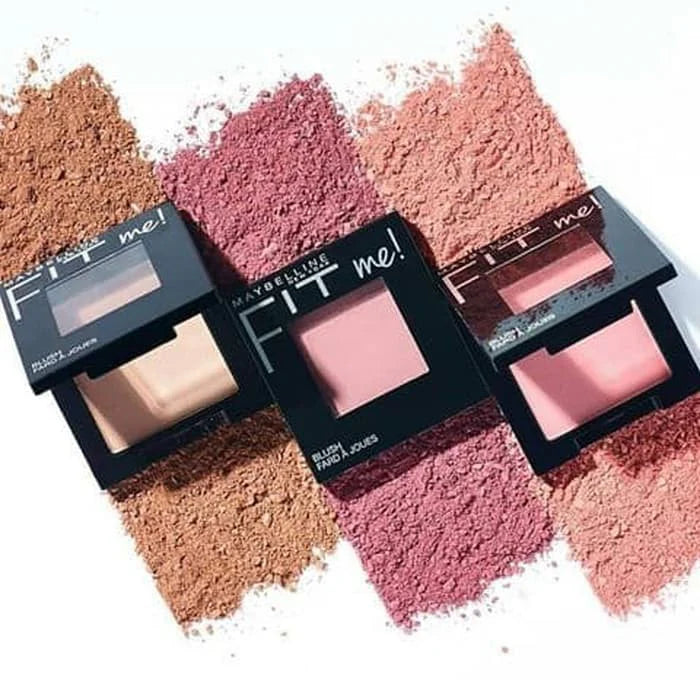 Maybelline Fit Me blushes in various shades on a white background