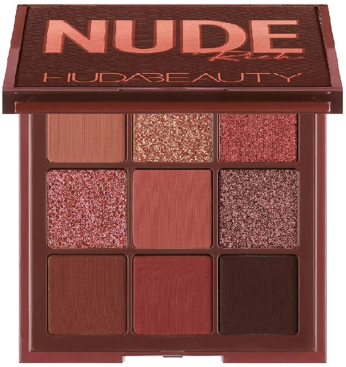 Huda Beauty nude eyeshadow palette with multiple shades on a white background