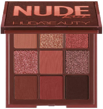 Huda Beauty nude eyeshadow palette with multiple shades on a white background